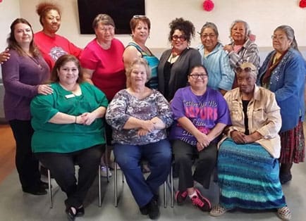 group of women making art